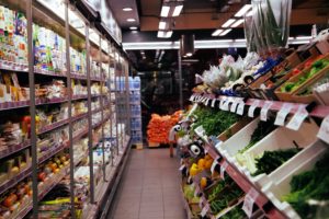 aisle in supermarket with fresh produce