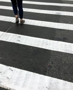 someone walking on a crosswalk