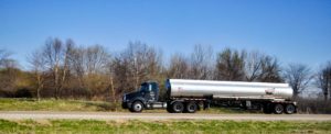 tanker truck driving on the road