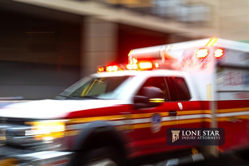 A blurred ambulance races through the bustling streets of New York City, a beacon of hope and help in times of need.